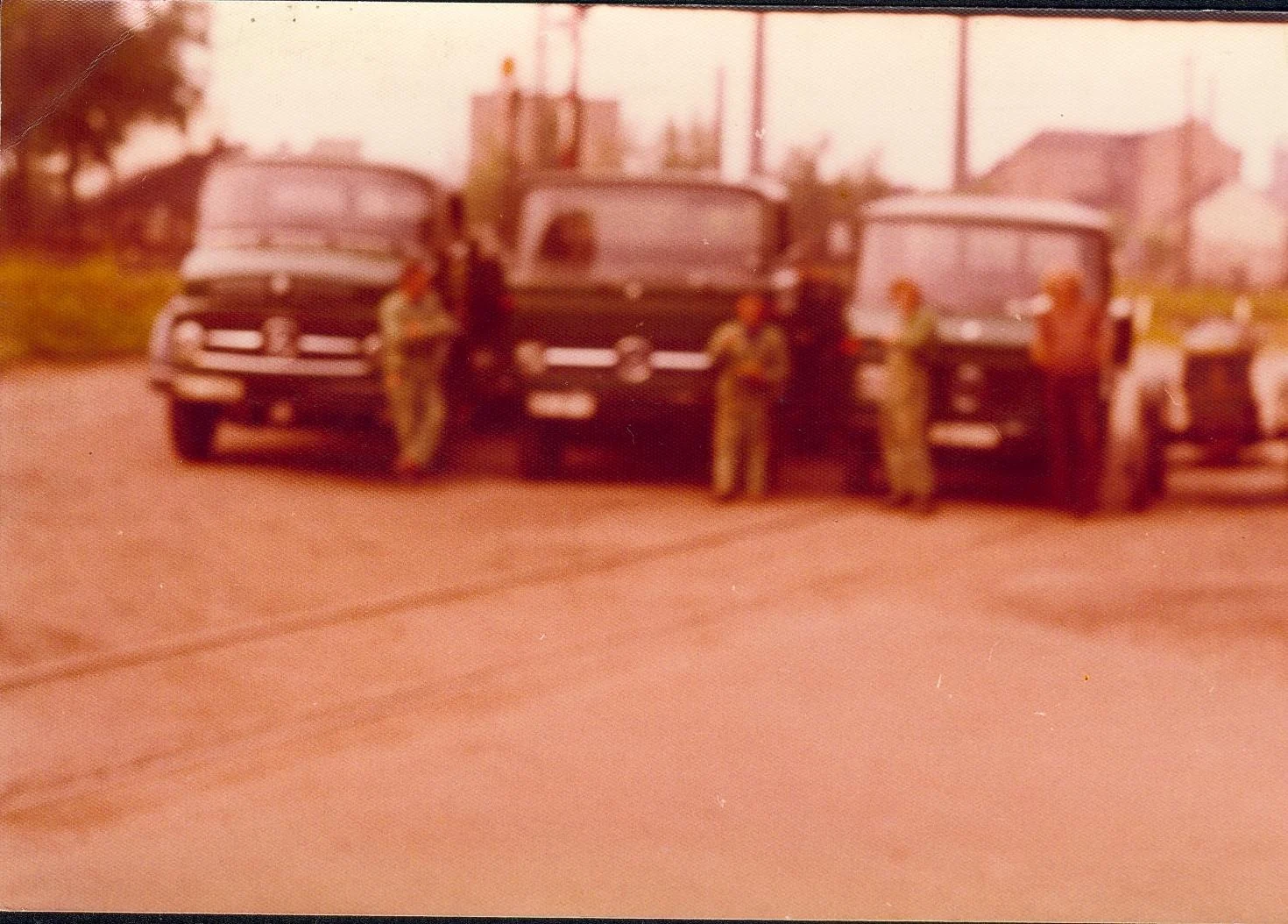 Several old Franz Huisgen trucks from the 1970s and 1980s
